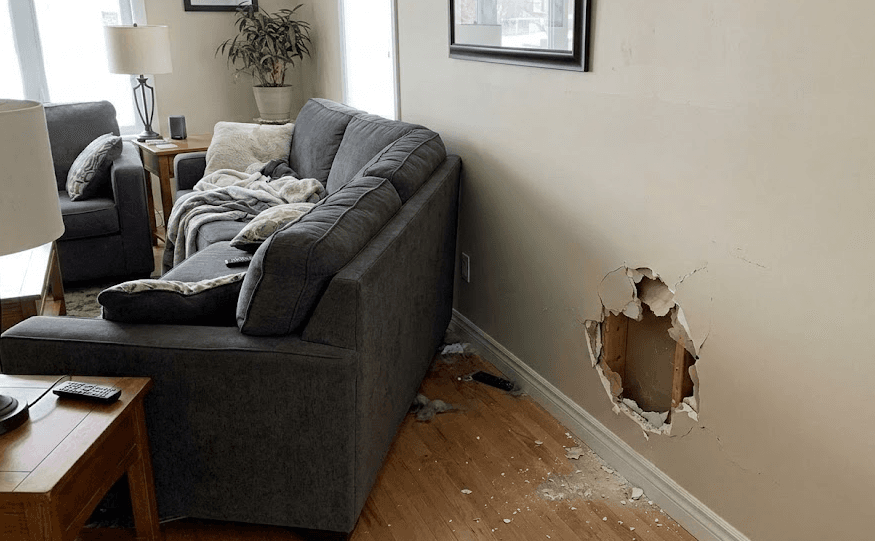 Tenant damage: hole in apartment wall